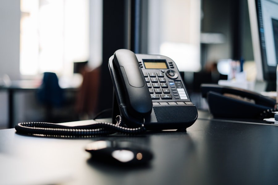 Office phone on a desk, ready to take your call