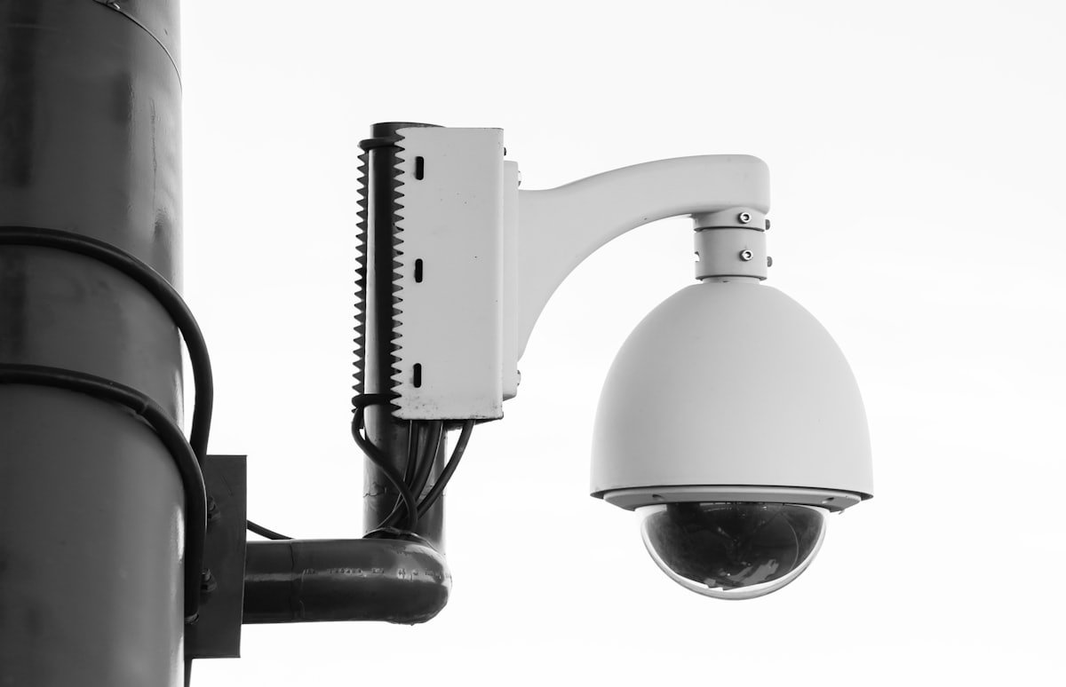 PTZ dome CCTV camera on a mounting bracket
