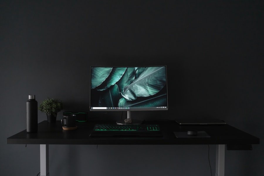 Office workstation with monitor, keyboard and desk setup