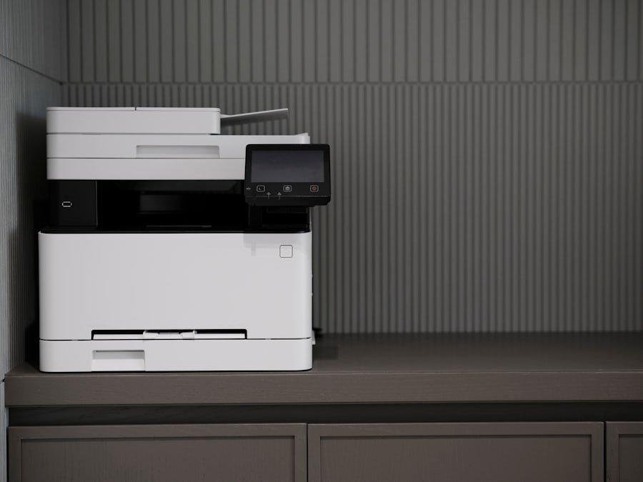 White multifunction office printer on a counter